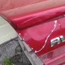 Крышка багажника Шевроле Авео Т250 седан - вмятина слева